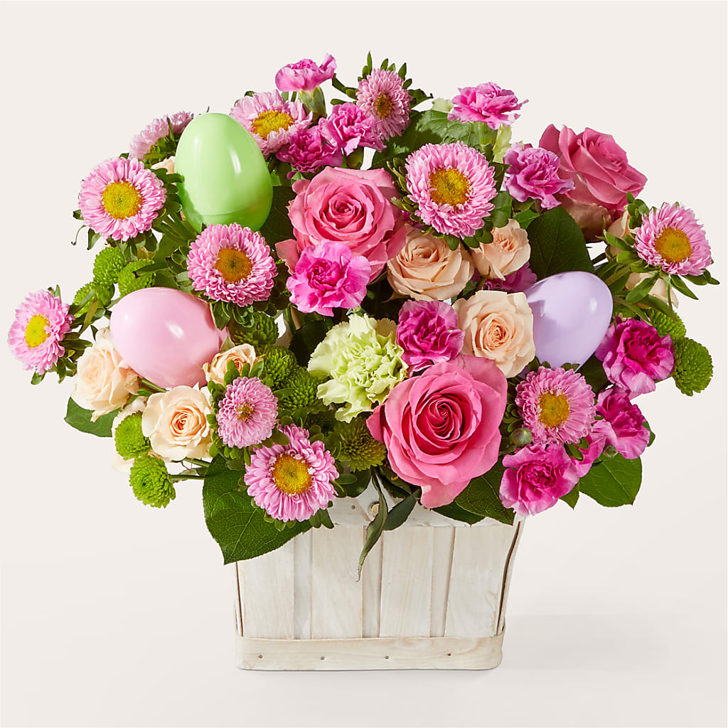 Get Eggcited Basket – green, peach, pink flower arrangement